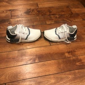 White (with black) Adidas Ultraboost.